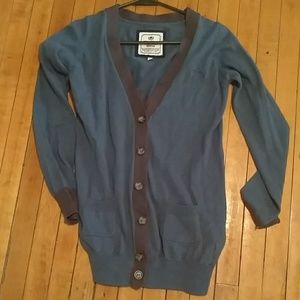 Blue cardigan with a brown trim